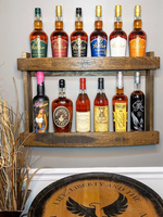 Load image into Gallery viewer, Dark walnut bourbon whiskey liquor barrel stave shelf, wood bottle display cabinet, wall mount, easy installation, staged with bourbon bottles
